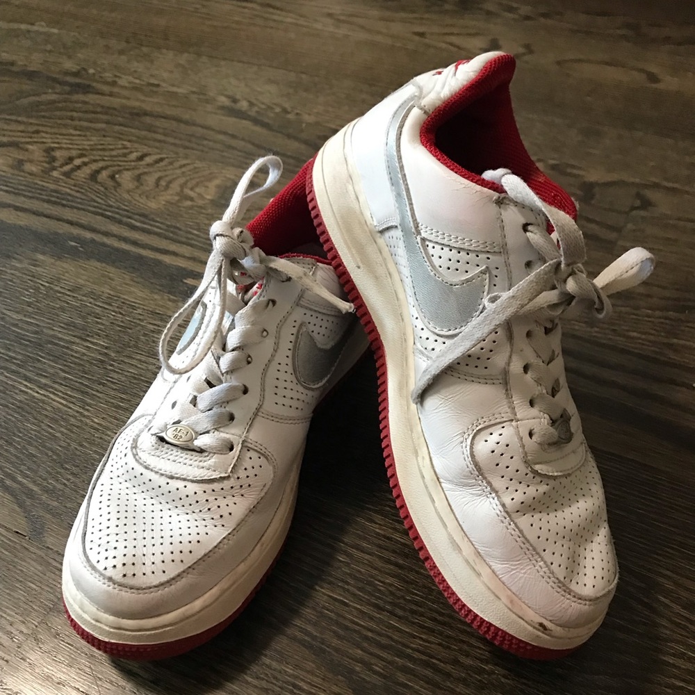 Nike sneakers with red trim